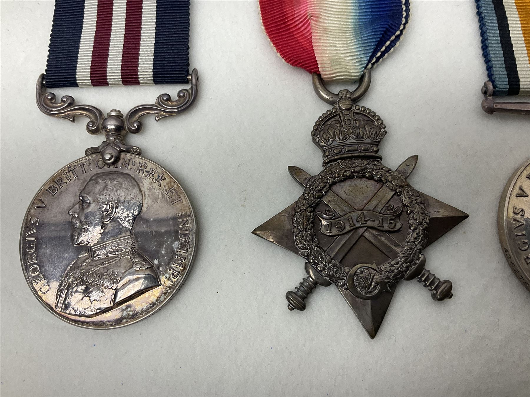 WWI Military Medal awarded to S-3957 Pte. W. Wood Med. Unit R.M. as reported in the London Gazette 14th May 1919 for services at 'the British Offensive 1918 Drocort-Queant Line and subsequent Operations' with archive of research information and original bill of purchase from Spink & Son dated 5/9/1957; together with a WWI group of three medals comprising British War Medal, Victory Medal and 1914-15 Star awarded to 1732 Pte. D. Newton R.A.M.C.