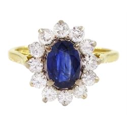 18ct gold oval sapphire and round brilliant cut diamond cluster ring, Birmingham 1994, sapphire approx 1.00 carat, total diamond weight approx 0.70 carat