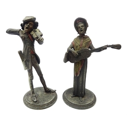  Pair 19th century painted spelter candlesticks after Francois George, modelled as caricatures of a male and female musician, H28.5cm max  