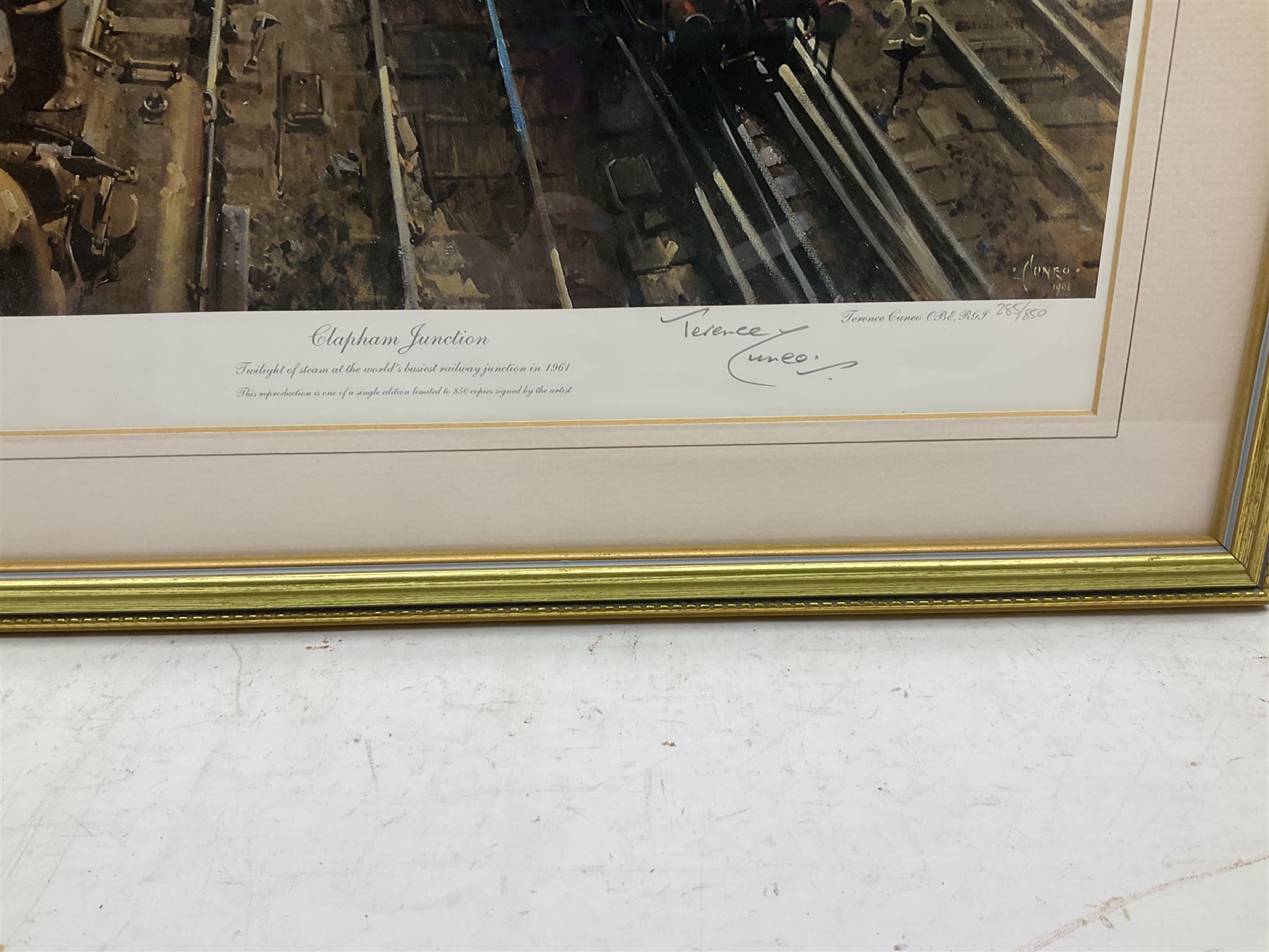 Terence Cuneo (British 1907-1996): 'Clapham Junction', limited edition chromolithograph signed and numbered 285/850, certificate verso 31cm x 41cm 