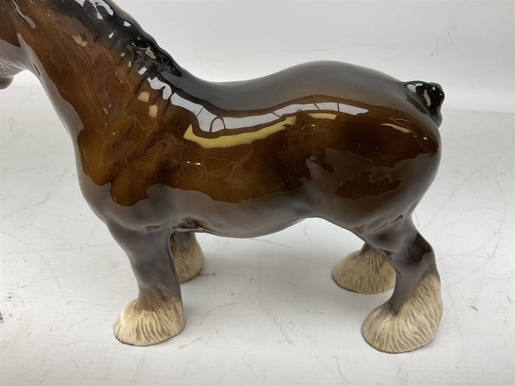 Six Beswick figures of bay horses, including large hunter no.1734, Shire horse no.818, horse with tucked head no.1549, etc (6)