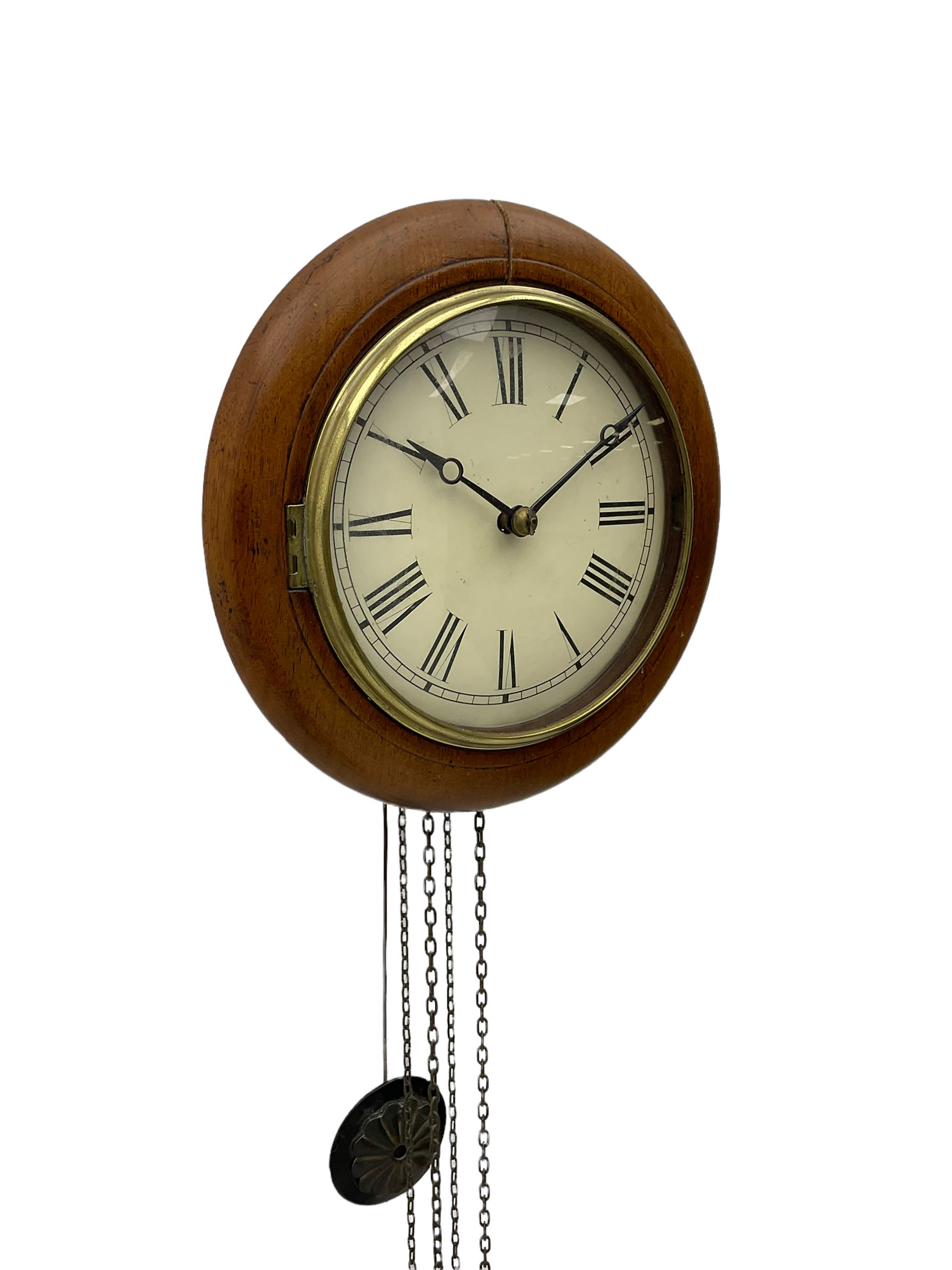 Small late 19th century German Bavarian wall clock c1880, 6” painted dial with Roman numerals, minute track and steel moon hands, cast brass bezel and flat glass with a mahogany surround, chain driven striking movement striking the hours on a bell, wooden plated movement with brass wheels and lantern pinions. With original pendulum and original weights.

