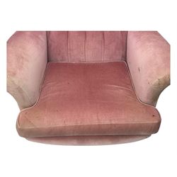 Paul Conti for G-Plan - 'Blofeld' Model 6250 swivel wingback armchair, upholstered in pink velour button back fabric, on teak base with castors