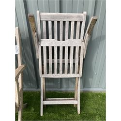 Set four teak slatted folding garden armchairs - THIS LOT IS TO BE COLLECTED BY APPOINTMENT FROM DUGGLEBY STORAGE, GREAT HILL, EASTFIELD, SCARBOROUGH, YO11 3TX