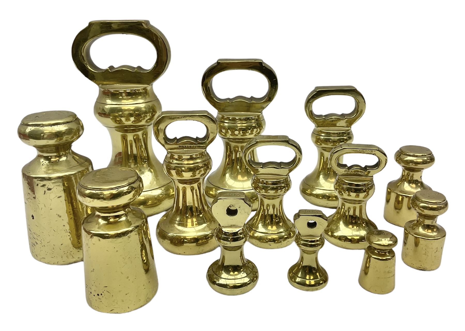 Graduated set of eight brass bell weights, together with a set of five graduating weights (13)