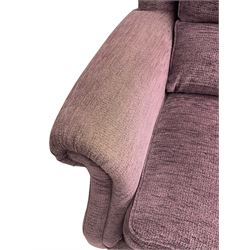 Parker Knoll - pair of large two-seat sofas upholstered in purple fabric, turned mahogany finish front feet with brass cups and castors 