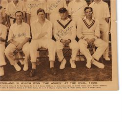 1920s All Sports Illustrated magazine page, depicting the 1926 Ashes winning England cricket team, signed by seven players including Maurice Tate, Greville Stevens, George Geary, Herbert Sutcliffe, Herbert Strudwick, Jack Hobbs and Wilfred Rhodes, mounted on card
