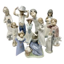 Eleven Nao figures to include Cowboy, Girl with Puppy, Clown, Girl in hat etc 