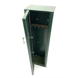 Green metal gun cabinet with keys 