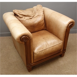  Armchair upholstered in leather, walnut scrolled and carved frame and supports, W105cm  