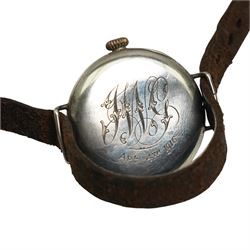 WWI wristwatch in silver case inscribed 'April 4th 1916' and a WWII open faced military G.S.T.P. pocket watch in nickel case