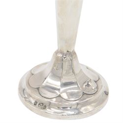 Two 1920s silver mounted trumpet vases, the first example of faceted form, hallmarked James Deakin & Sons, Sheffield 1921, the second example with fluted rim, hallmarked Walker & Hall, Birmingham 1922, tallest H25cm
