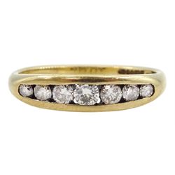 9ct gold channel set seven stone graduating diamond ring, Birmingham 1996