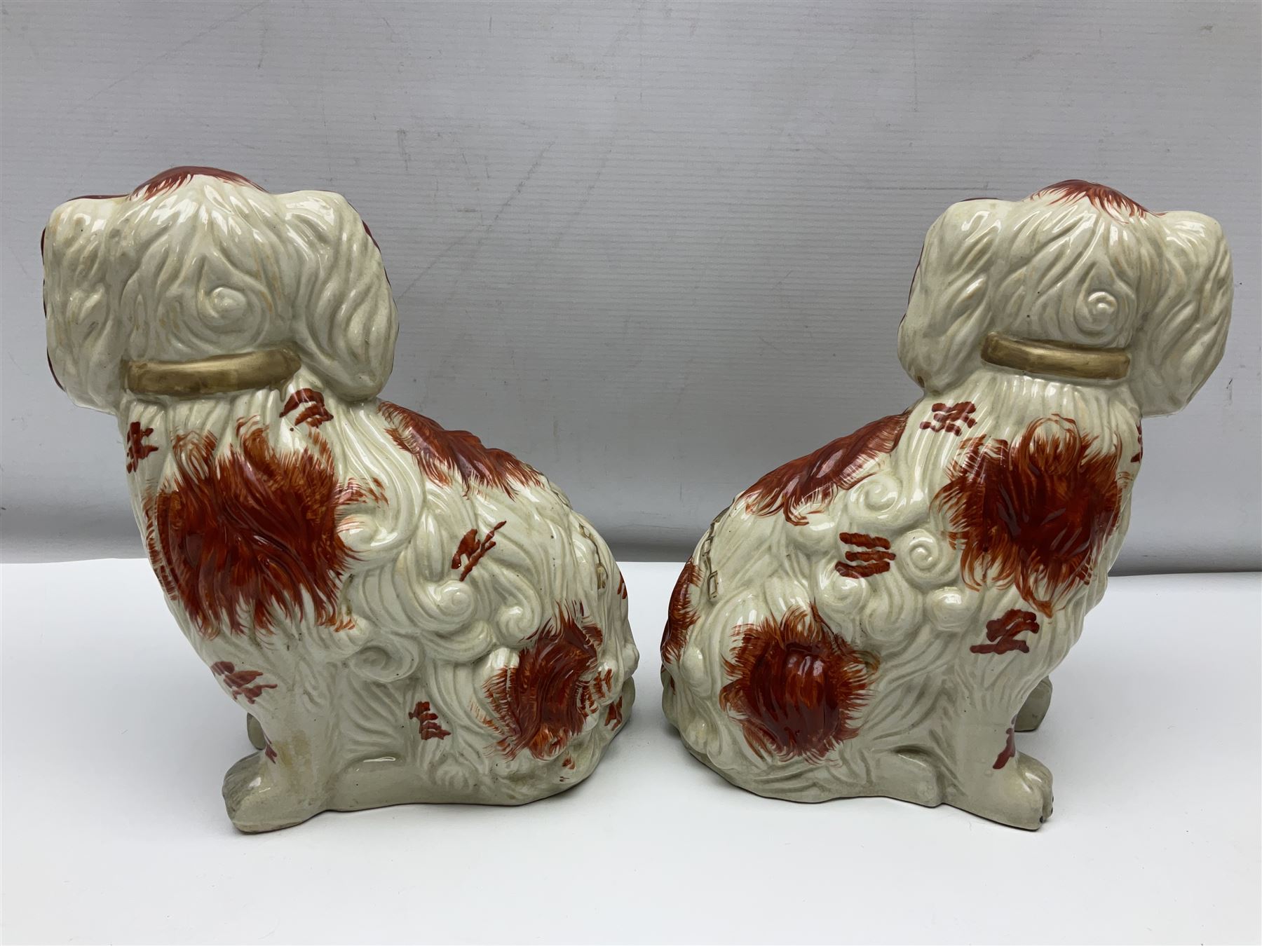 Two Pairs of Staffordshire style dogs, together with three other examples, largest example H27cm