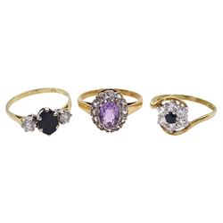 Three stone sapphire and cubic zirconia ring, one other cubic zirconia cluster ring and a pink stone and stone set dress ring, all 9ct hallmarked or tested