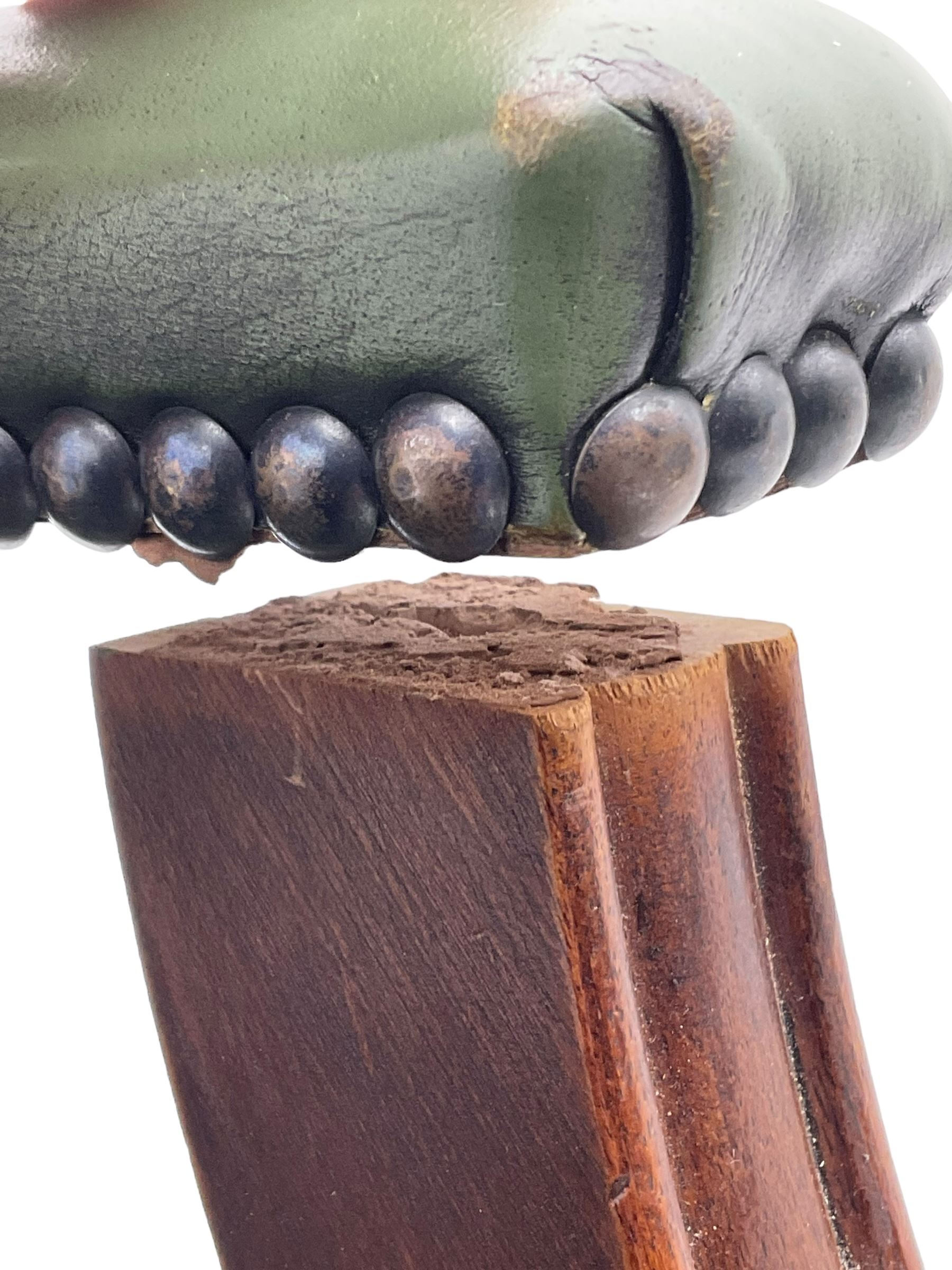 Georgian design swivel office desk chair, upholstered in buttoned green leather, on five spoke base with castors 