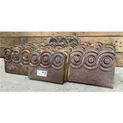 Twenty six Victorian terracotta edging tiles