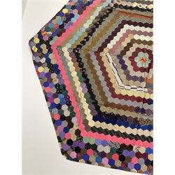 An early/mid 20th century hexagonal patchwork cover of hexagonal form, L164cm. 