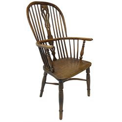 19th century yew wood and elm Windsor chair, high hoop and stick back with pierced splat over dished seat, raised on ring turned supports united by crinoline stretcher