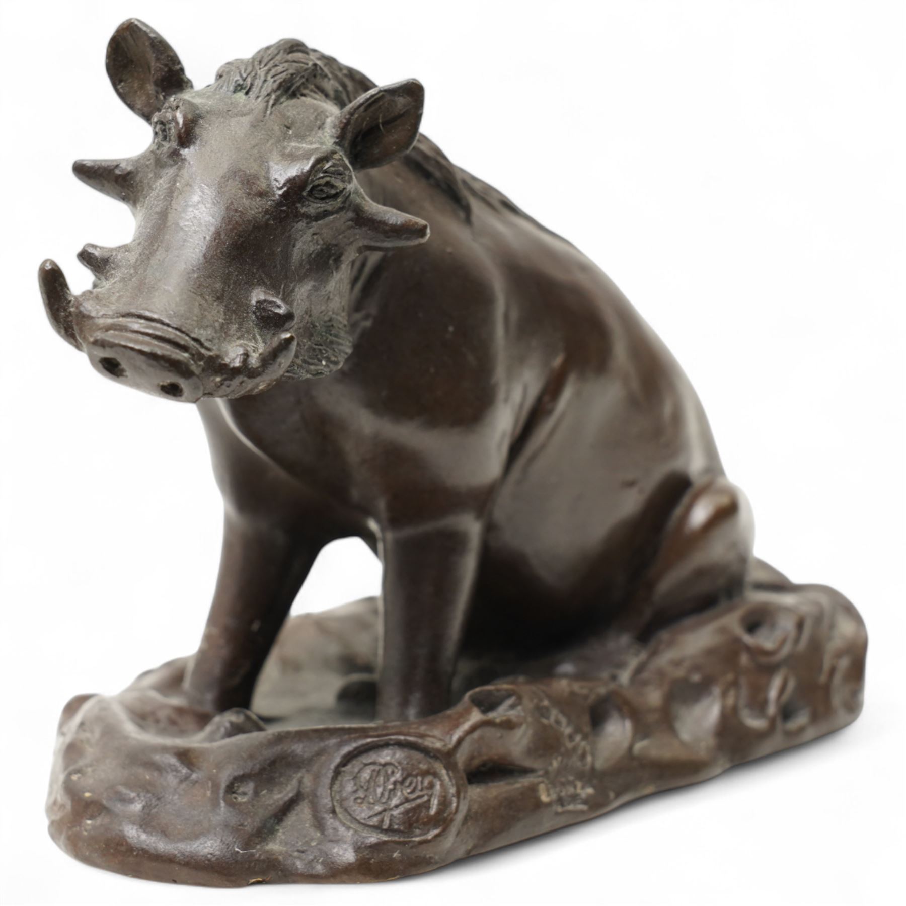 Donald Greig (South African 1959-): Seated Warthog, bronze, signed, 2007, 9cm x 13cm with certificate