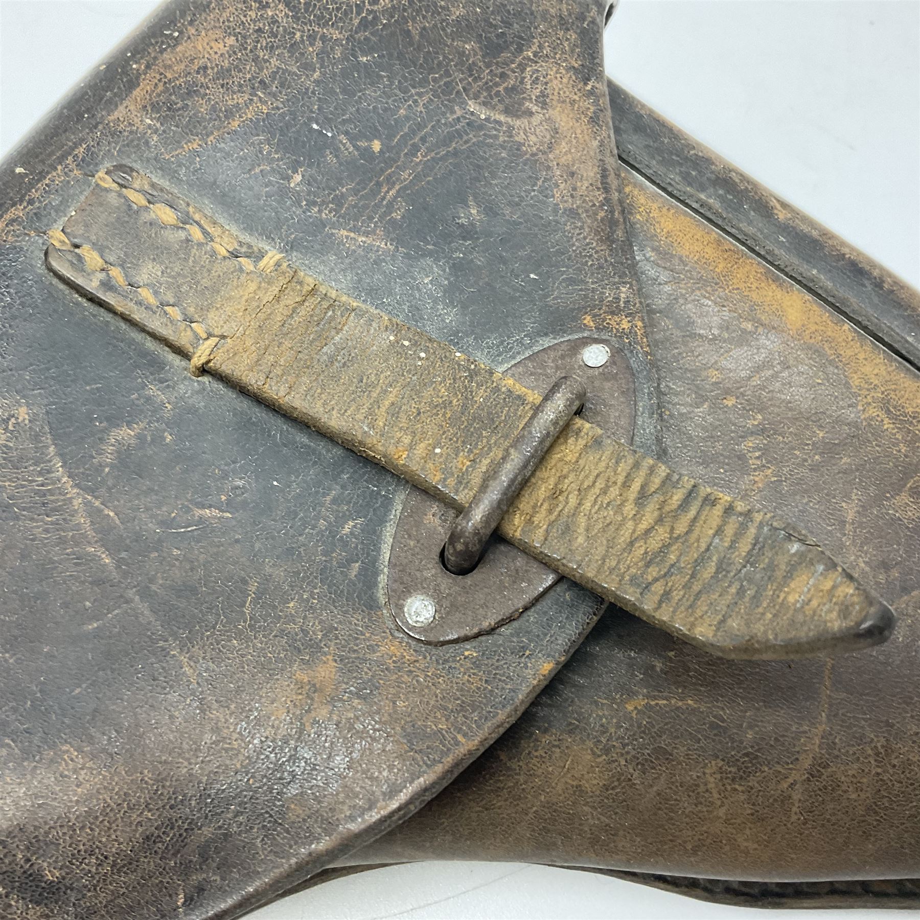 WWII German brown leather holster with side magazine pouch for a Walther P.38 semi-automatic pistol, stamped P38 and OWX 1941 on back L24.5cm