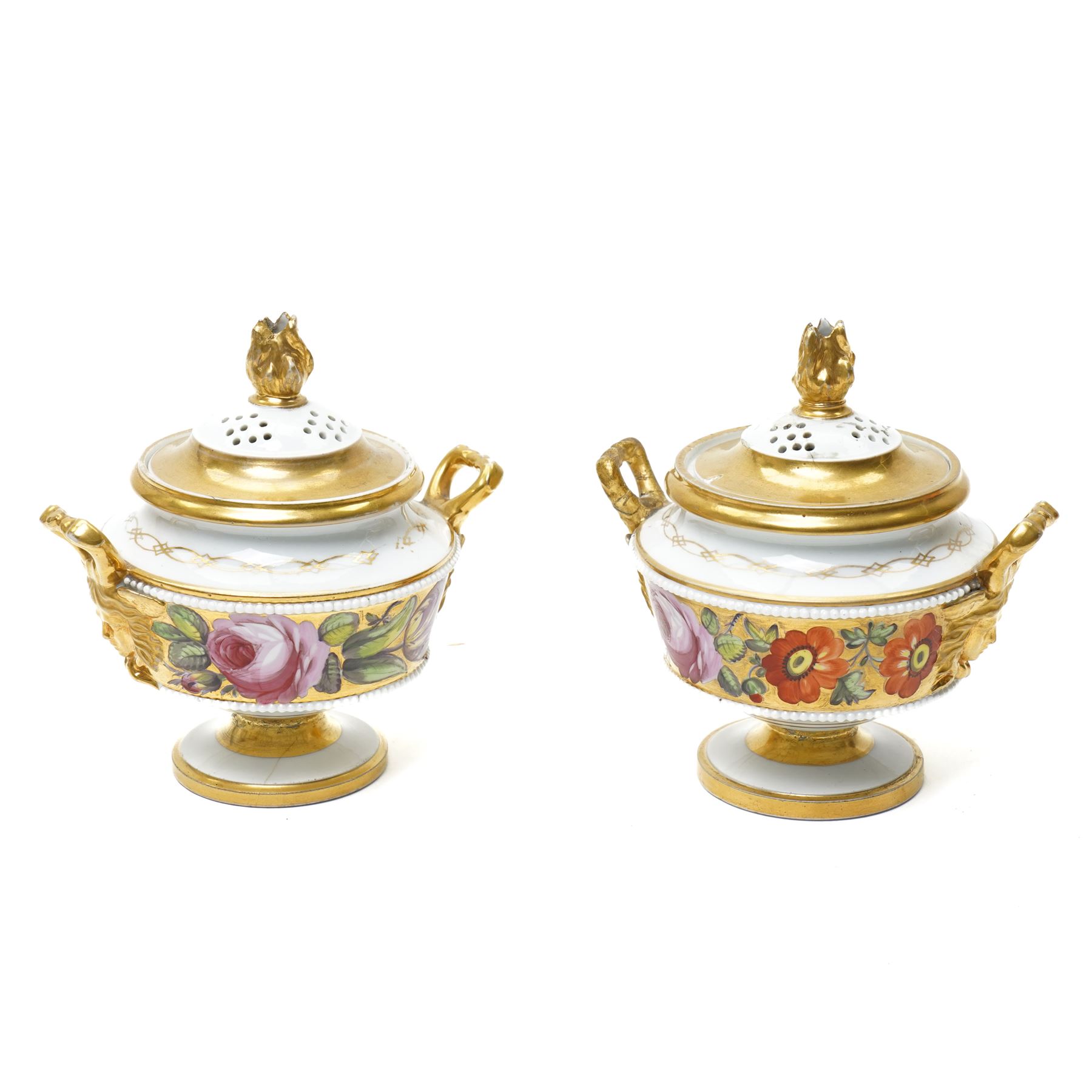 Pair of early 19th century potpourri, possibly Swansea, with twin gilt mascaron handles, the body painted with flowers on a gilt ground, spurious mark in red to base, H13cm  