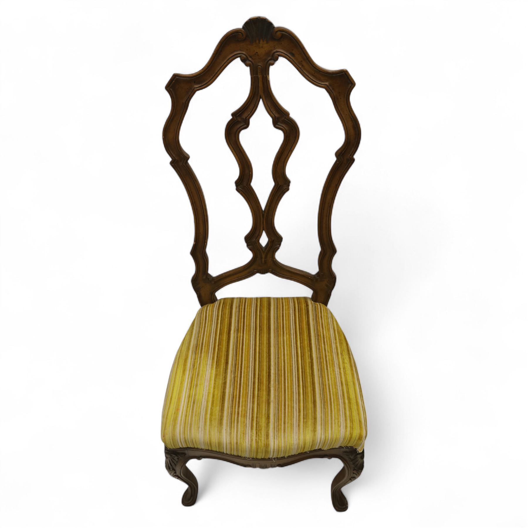 20th-century set of four French provincial-style stained beech dining chairs, pierced cartouche back with fan carving, with a scroll moulded frame above a padded serpentine seat on cabriole legs 