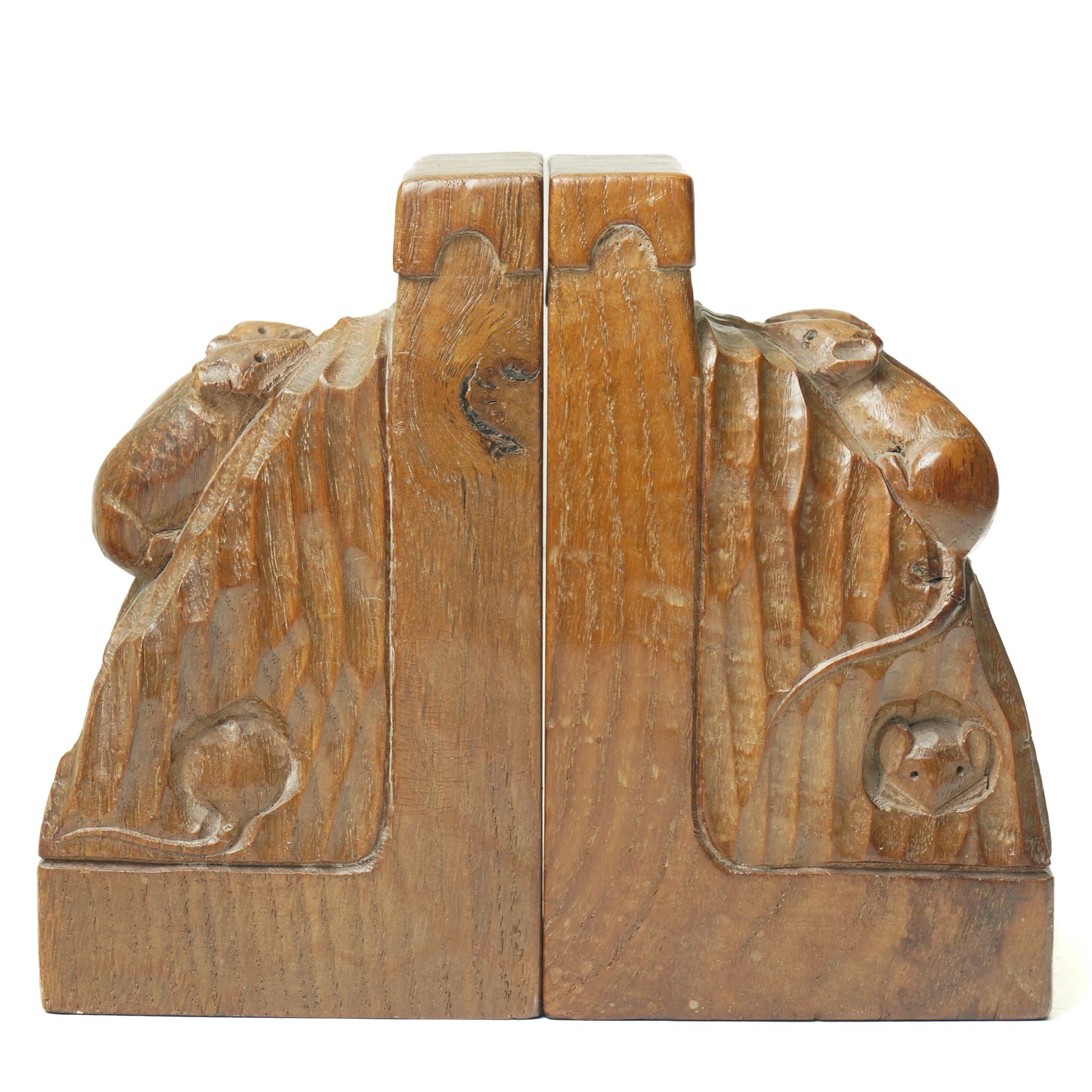 Mouseman - pair of oak triple mouse bookends, each carved and tooled with three mice, by the workshop of Robert Thompson of Kilburn H16cm