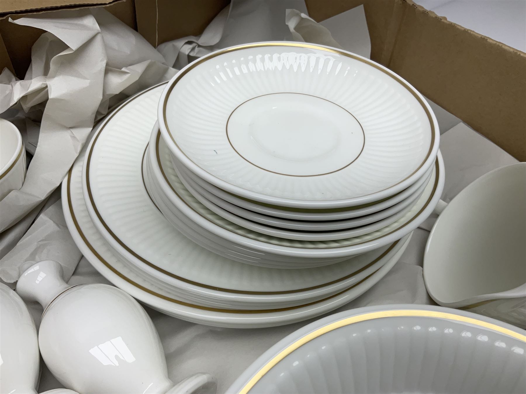 Wedgwood Insignia pattern tea and dinner wares, Wedgwood Chelsea gold pattern teapot and two Wedgwood soup bowls and saucers