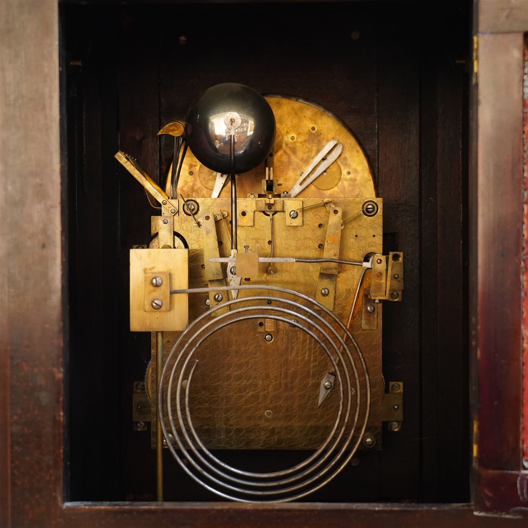 Late 19th century bracket clock with three train movement, Westminster Chimes on eight bells and gong strike, the brass dial inscribed 'Webber Liverpool' with gilt brass mounts in mahogany dome top case with pineapple finial, brass handles and classical columns on compressed circular feet H76cm