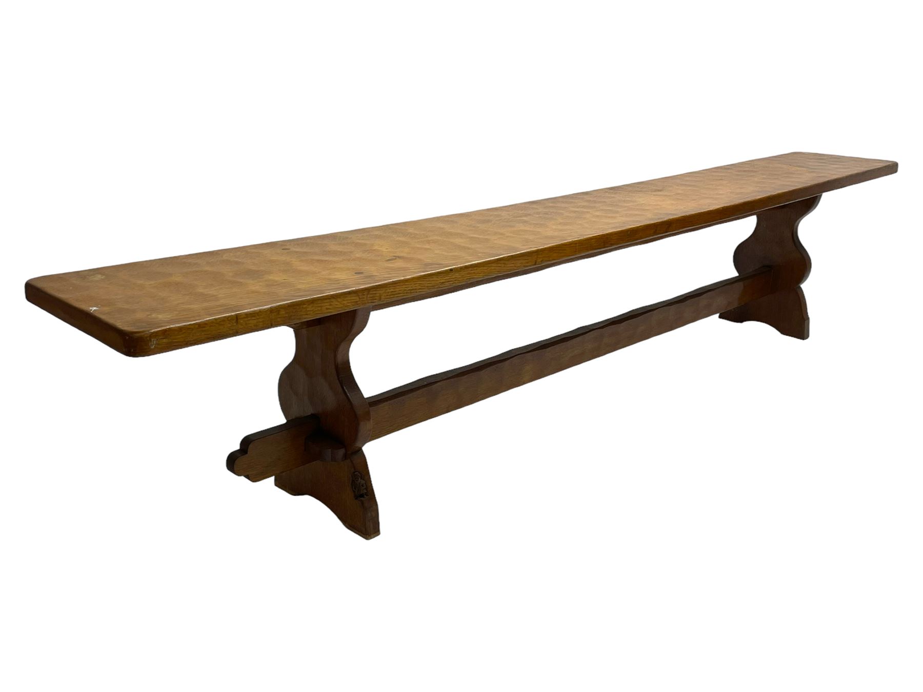 Gnomeman - adzed oak narrow bench, rectangular seat on shaped end supports united by pegged stretcher, carved with gnome signature, by Thomas Whittaker, Little Beck 