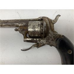 19th century 7mm six-shot pin-fire revolver, with folding trigger, two-piece ebonised grip and ejector rod in butt L17cm