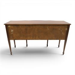 Georgian design mahogany serpentine sideboard, shaped top over two central drawers flanked by cupboard doors, flame mahogany veneered fronts with satinwood stringing, oval brass handles, shaped apron, on square tapering supports with spade feet