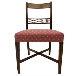 Set of eight (6+2) Regency mahogany dining chairs, rail and lozenge pierced rail back over reeded uprights, swept arm rests and turned arm terminals, upholstered seats, raised on square tapered reeded supports united by 'X' stretchers W52cm
