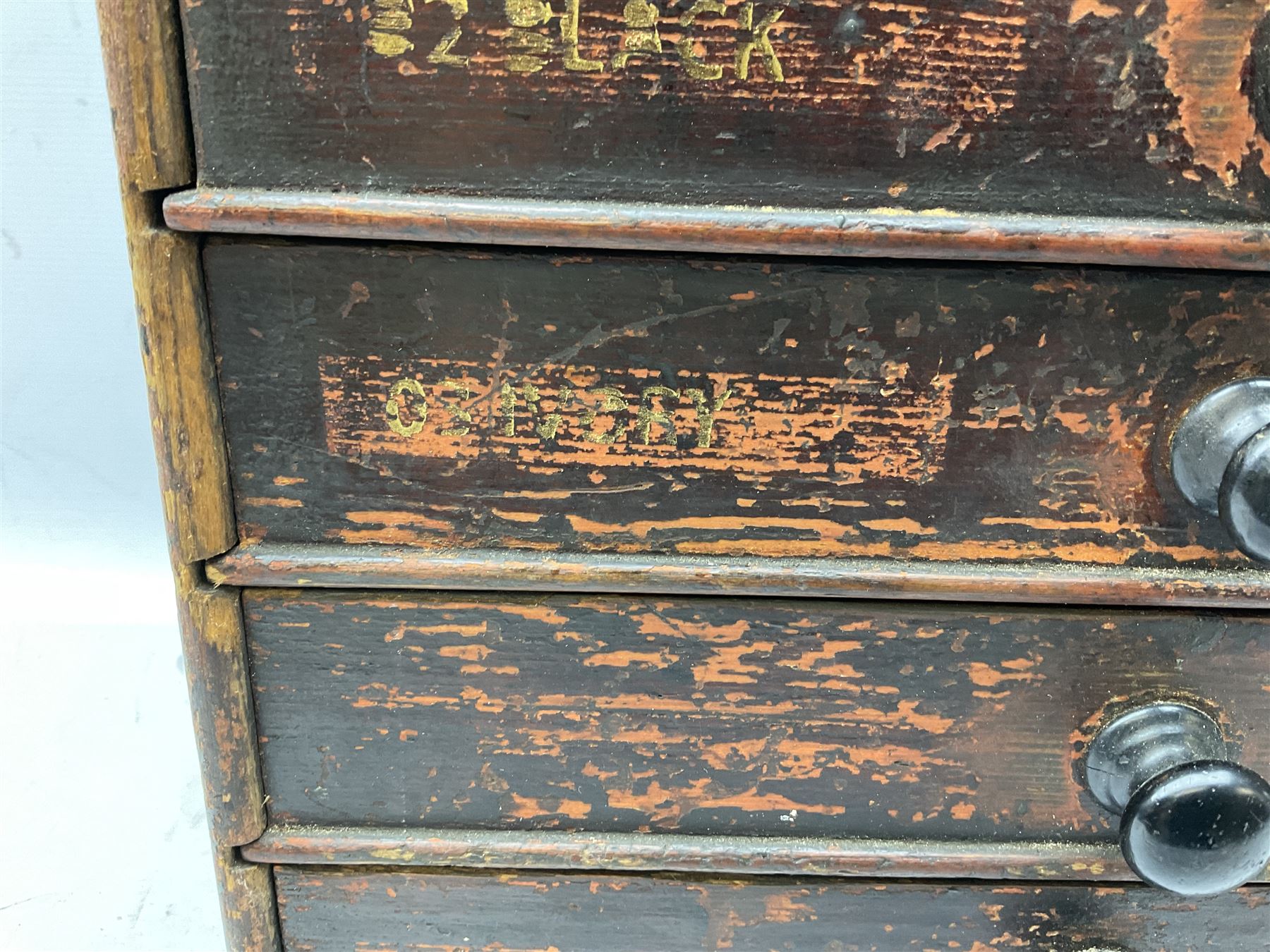 Early 20th Century Dewhurst table top chest, decorated with gilded 'Dewhurst's Sylko Machine Twist Strong Lustrous' lettering above six long drawers with names and numbers of cotton also detailed in gilt, H39cm
