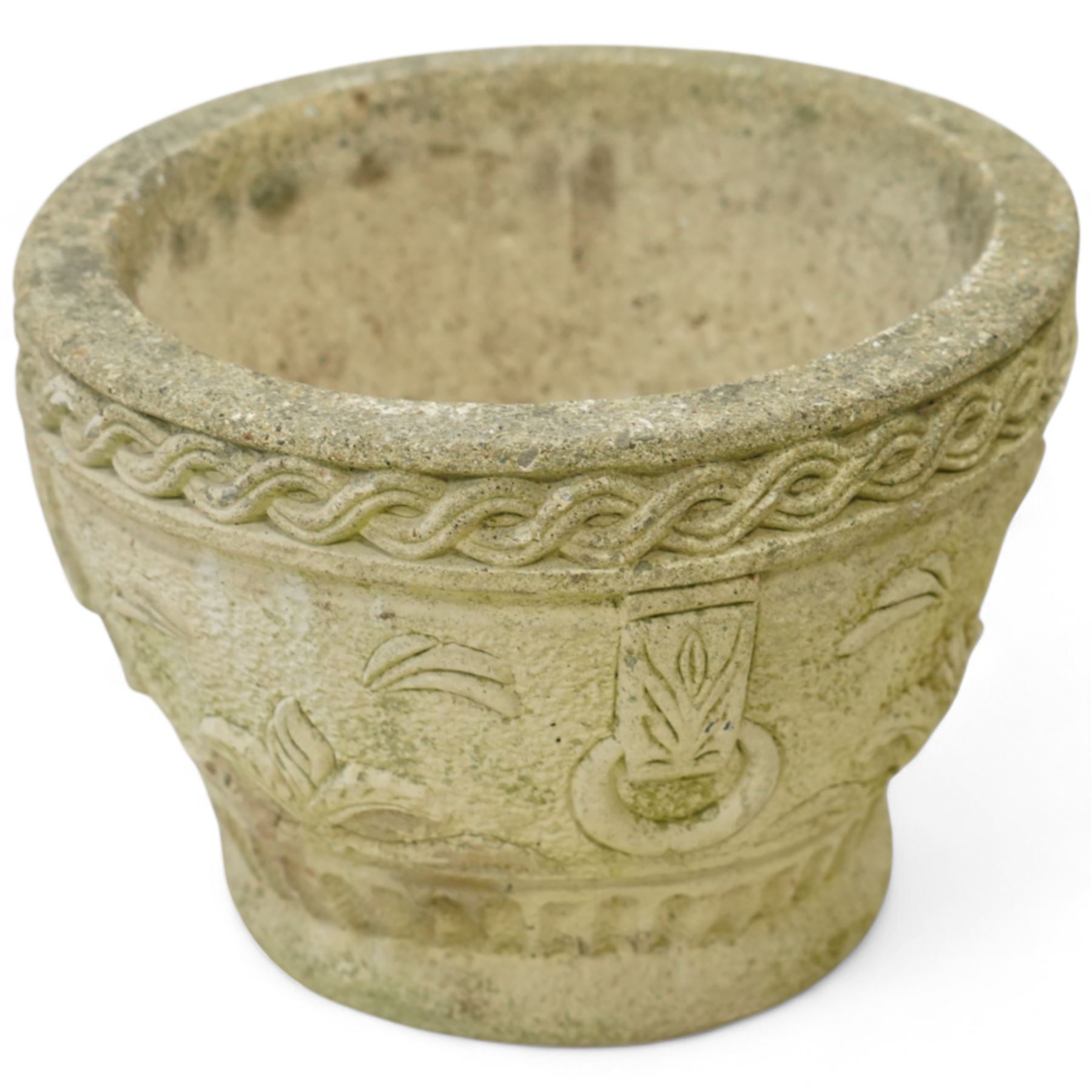 Cotswold Studios - set of three cast stone garden planters, comprising a rectangular trough with rose decoration (H 18cm, D 21cm, W 61cm) and two round pots with stylised floral and ropework borders (H 24cm, D 34cm)