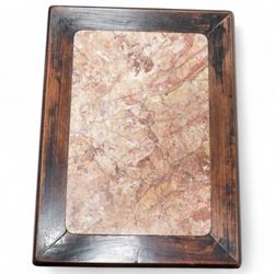 Early 20th century Chinese carved hardwood and marble urn stand, rectangular moulded top with inset variegated rouge marble, carved with curling leafy branches and scrolls, shaped and pierced brackets, on ball and claw carved supports 