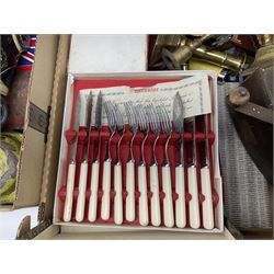 Collection of silver plated cased cutlery including part canteens and butter knives, together with other metal ware including J&J Siddons iron, horse brasses and a copper kettle, 1970s children's annuals including Beano, two handbags and three suitcases, vintage tins etc, in four boxes 