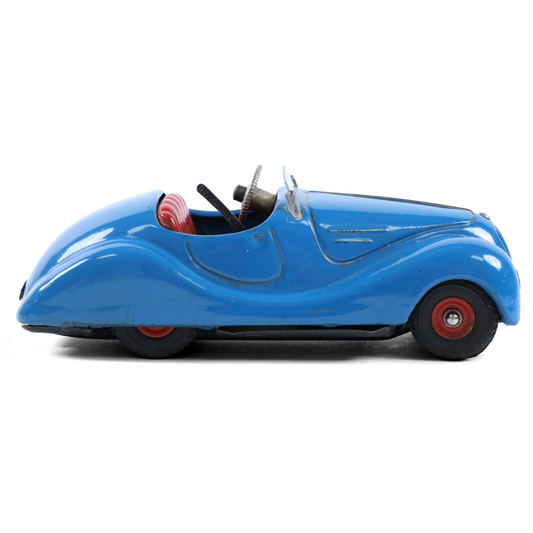 Schuco Akustico 2002 tinplate clockwork car, in blue with red interior, with key, boxed