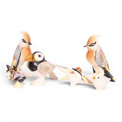 Collection of Goebel bird figures signed by designer George Selim, including two Jays, a Puffin and three others 