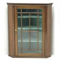  Georgian oak wall hanging corner cabinet, single door enclosing three shaped shelves, W79cm, H95cm, D43cm  