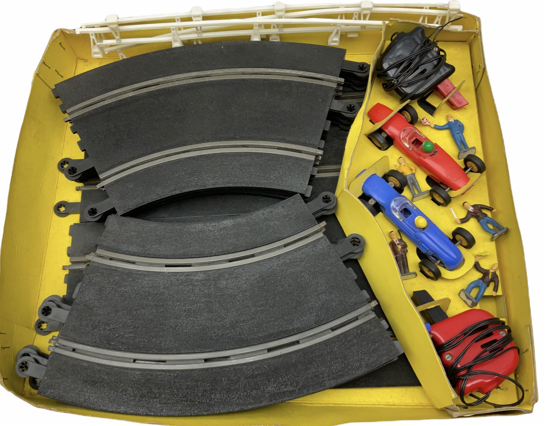 Scalextric - Marks & Spencer Starsky & Hutch set with '76 Gran Torino and Chevrolet Corvette cars, boxed; an earlier Tri-ang Scalextric 'Set 30' Model Motor Racing set containing Lotus and Cooper racing cars with controllers, track, figures and instruction pack, boxed; and a Scalextric catalogue Fifth edition c1964