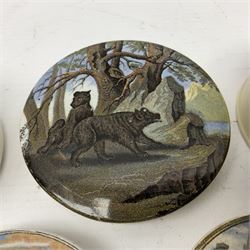 Six 19th century Prattware pot lids comprising 'The Village Wakes', three 'Bear on Rock', 'Shooting Bears' and 'Bear, Lion and Cock', two with associated bases, largest D9cm (6)