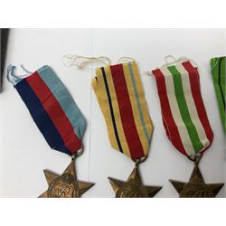 WWI pair of medals comprising British War Medal and Victory Medal awarded to 32682 Pte. W. Meadows W. Rid. R. in issue box; WWI pair of medals comprising 1914-15 Star and Victory Medal awarded to 3720 Pte. (later Cpl.) E. Petty W. York. R. with issue letter from Tank Corps; WWII group of five medals comprising 1939-45 War Medal, Defence Medal and 1939-45, Italy and Africa Stars; all with ribbons; and book of nineteen seaman's Certificates of Discharge to cook Charles Filburn 1893 - 1901 from various British ports