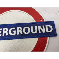  London Underground painted cast metal wall plaque, D24cm