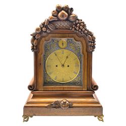 Large early to mid 19th century walnut bracket clock by Penlington of Liverpool, the highly decorative fruit and berry carved pediment over shaped and moulded glazed door, gilt metal and blue enamel Roman dial engraved with chased scrolling foliage and flower head decoration, moulded and plain frieze base on ornately cast gilt metal bracket feet, twin fusee ting-tang movement striking the quarters on two bells, strike silent lever, movement back plate inscribed 'Penlington of Liverpool', the back enclosed by pointed arch door with fret work panel, circa. 1830

Provenance - Sold in 1968 in the estate sale of Mr. E.D. Midwood, Green Glade, Portnall Drive, Wentworth, Surrey (Tufnell & Partners Auctioneers) 