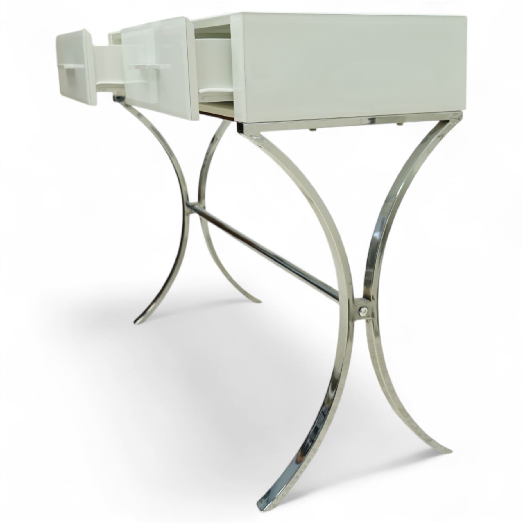 Contemporary white and chrome console dressing table, rectangular top over twin drawers with integral bar handles, raised on curving polished chrome supports united by a tubular stretcher