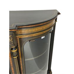Victorian ebonised and inlaid credenza, break-front with curved ends, the front fitted with two curved glazed doors and central panelled door, inlaid with scrolling foliate and star motifs, quadruple turned and fluted pilasters to front, gilt egg and dart moulded edge on plinth base with figured walnut band, on turned feet