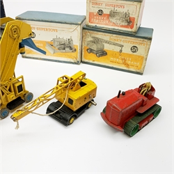 Dinky - Elevator Loader No.564, boxed with internal packaging; Blaw Knox Bulldozer No.561; Heavy Tractor No.563; and Coles Mobile Crane No.571, all boxed (4)