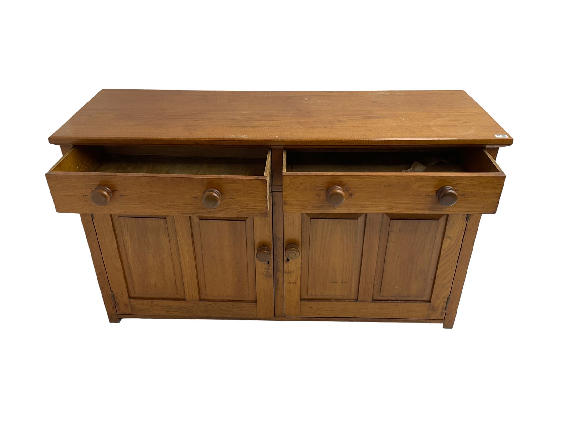 JAS Brister & Co Ld - Mid-20th century teak sideboard, fitted with two drawers over two panelled cupboards, stamped 'JAS. Brister & Co Ltd., Complete House Furniture, Port Elizabeth'